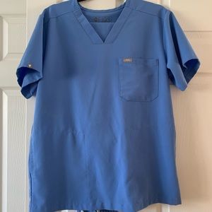 Light blue FIGS technical collection scrubs set